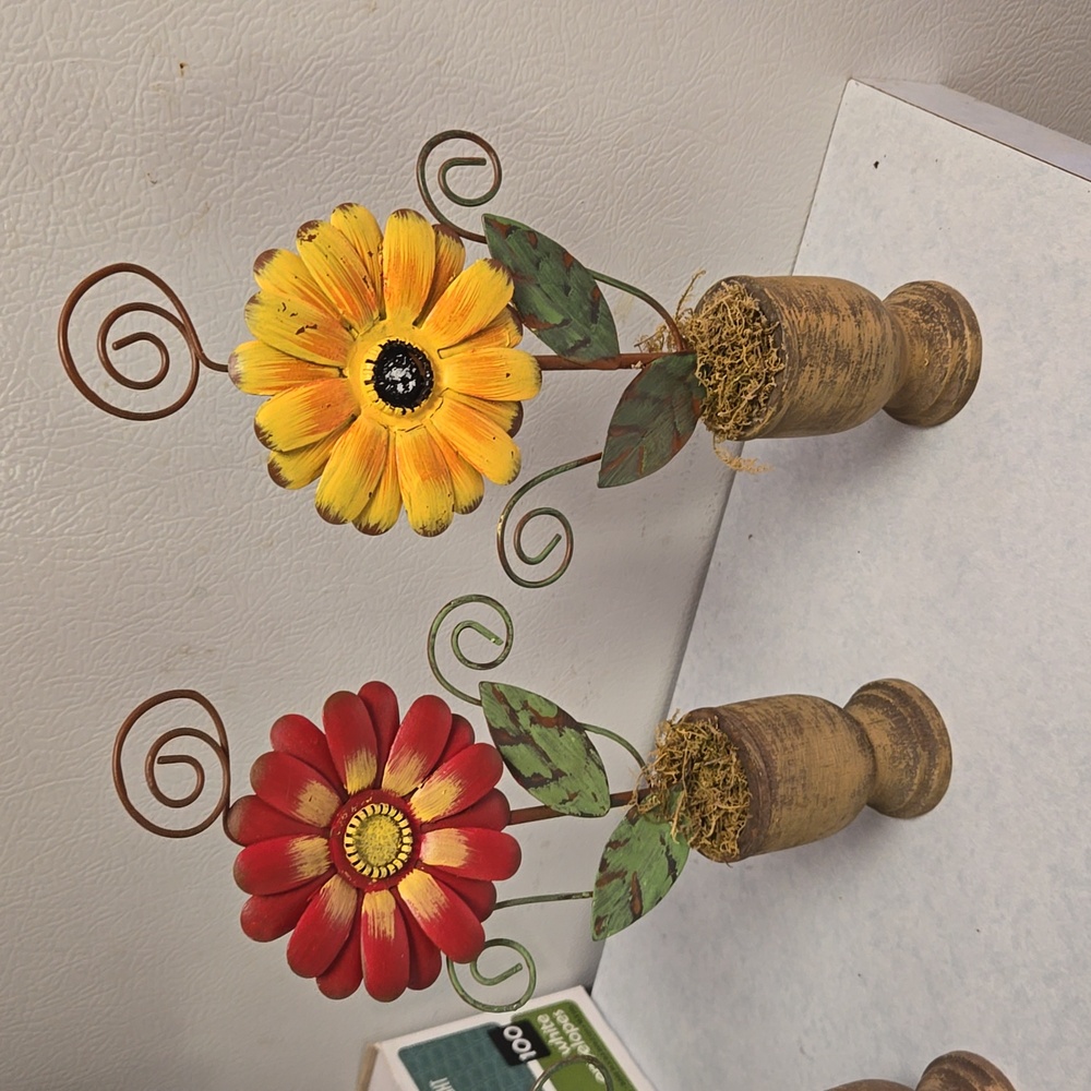 Metal and wood flower decorations.